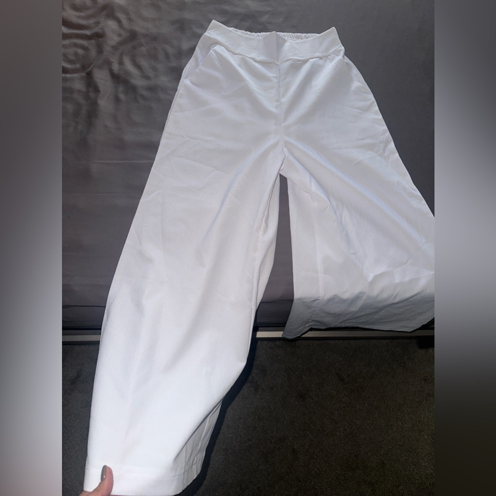 White flare pants